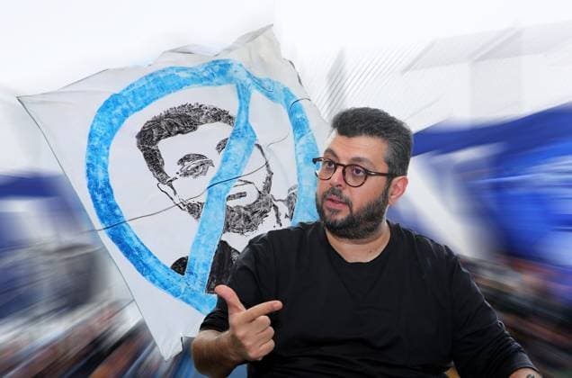ATTENTION PHOTO MONTAGE Here in the picture Hasan Ismaik, who would allegedly be willing to sell his shares in TSV 1860 Munich if a buyer could be found in the background the flag with Hasan Ismaiks crossed-out head by fans in the Westkurve, Ultras who hate him, ingratitude who want him gone, freedom for Sechzig, background is dynamically blurred