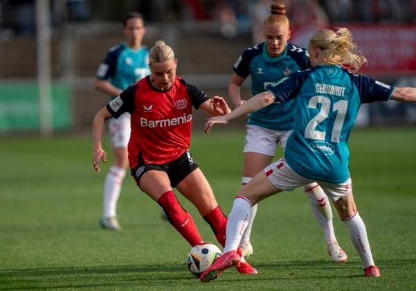 duel between Cornelia Kramer Bayer 04 Leverkusen, 7 and Anna Gerhardt 1 FC Koeln, 21 14 04 2025, Bayer Leverkusen 1 FC Köln, Fußball, Google Pixel Frauen Bundesliga, GER, Leverkusen, Ulrich Haberland Stadion, Saison 24 25, 19 Spieltag DFL regulations prohibit any use of photographs as image sequences and or quasi video Copyright: HMBxMedia xMarcoxBader