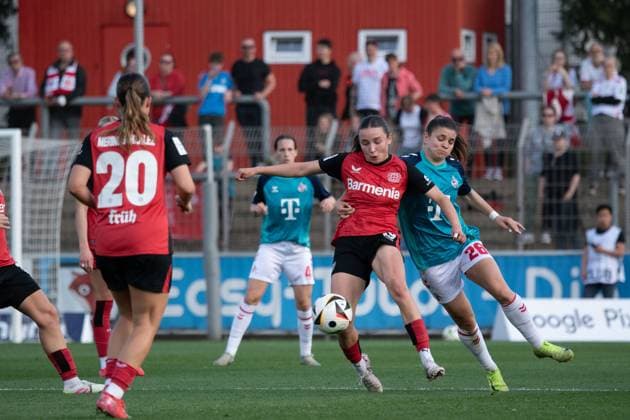 Leverkusen, Germany, April 14th 2025: Loreen Bender (19 Bayer Leverkusen) and Martyna Wiankowska (26 FC Köln) battle for the ball during the Google Pixel Frauen-Bundesliga between Bayer Leverkusen and FC Köln at Ulrich-Haberland-Stadion in Leverkusen, Germany. (Qianru Zhang SPP) Copyright: xQianruxZhang SPPx spp-en-QiZh-DSC_0581