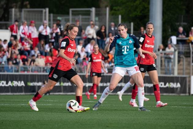 Leverkusen, Germany, April 14th 2025: Sofie Lena Zdebel (16 Bayer Leverkusen) and Taylor Ziemer (18 FC Köln) battle for the ball during the Google Pixel Frauen-Bundesliga between Bayer Leverkusen and FC Köln at Ulrich-Haberland-Stadion in Leverkusen, Germany. (Qianru Zhang SPP) Copyright: xQianruxZhang SPPx spp-en-QiZh-DSC_0651