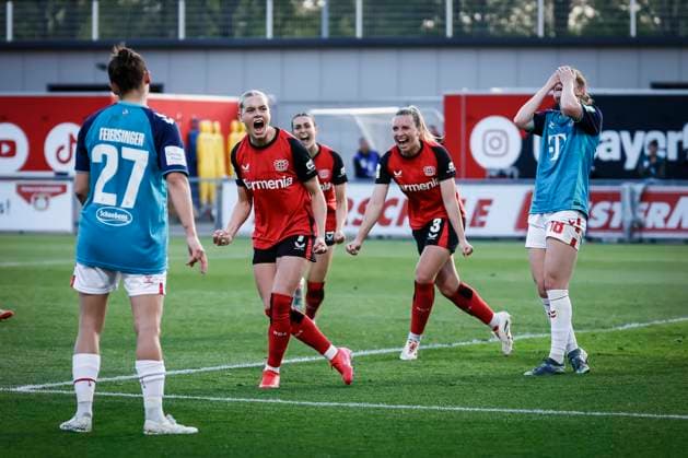 Womens Soccer Bundesliga Bayer 04 Leverkusen 1 FC Köln, 14 04 2025 Goal celebration after the equalizer by Cornelia Kramer Bayer 04 Leverkusen, 7 , Taylor Ziemer 1 FC Köln, 18 puts her hands in front of her face Bayer 04 Leverkusen 1 FC Köln on matchday 19 of the Google Pixel Womens Bundesliga on 14 04 2025 at Ulrich Haberland Stadium in Leverkusen North Rhine-Westphalia DFL REGULATIONS PROHIBIT ANY USE OF PHOTOGRAPHS AS IMAGE SEQUENCES AND OR QUASI VIDEO Copyright: xBEAUTIFULxSPORTS AxelxKohringx