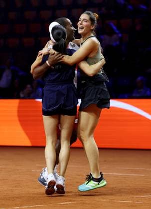 Stuttgart , Porsche Tennis Grand Prix , Doubles Mixed Showevent, from left Eva Lys, Cacau and Andrea Petkovic celebrate the victory