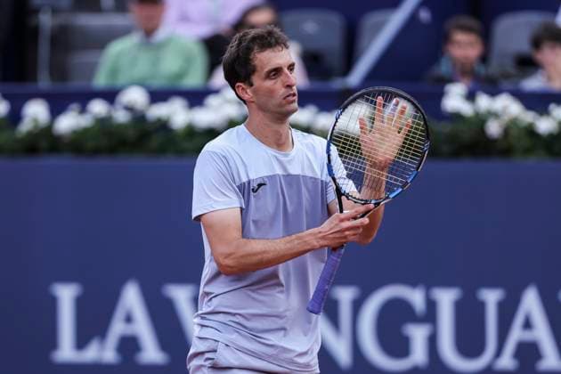 April 14, 2025, Barcelona, Barcelona, Spain: Albert Ramos-Vinolas of Spain in actions against Holge Rune of Denmark during the first round tennis match of the Barcelona Open Banc Sabadell - Conde Godo 2025 Day 1 at Real Club De Tenis Barcelona on April 14, 2025 in Barcelona, Spain. Barcelona Spain - ZUMAa181 20250414_zaa_a181_087 Copyright: xJavierxBorregox