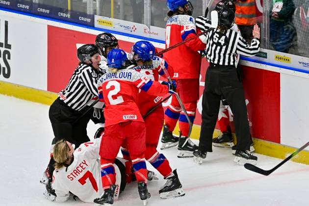 L-R Laura Stacey (CAN) and Aneta Tejralova (CZE) are seen in a skirmish during the IIHF Women s World Championship, WM, Weltmeisterschaft Group A, match Czechia vs Canada, in Ceske Budejovice, Czech Republic, on April 14, 2025. (CTKxPhoto VaclavxPancer) CTKPhotoP2025041407604  CTKPhotoP2025041407604