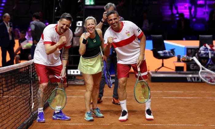 Stuttgart , Porsche Tennis Grand Prix , Doubles Mixed Showevent,, f l Zdravko Kuzmanovic, Laura Siegemund and Fernando Meira celebrate victory in soccer tennis