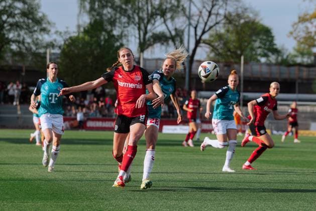 14 04 25, Women, Soccer, 1 BL, Season 2024 2025, Bayer 04 Leverkusen 1 FC Köln, Matchday 19 Caroline Kehrer 9 of Bayer 04 Leverkusen in duel with Janina Hechler 28 of 1 FC Köln Leverkusen Ulrich Haberland Stadion NRW Germany