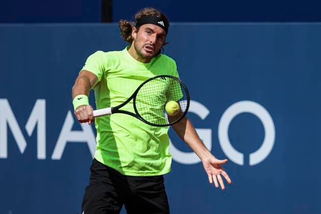 April 15, 2025, Barcelona, Barcelona, Spain: Stefanos Tsitsipas of Greece in actions against Reilly Opelka of United States during the first round tennis match of the Barcelona Open Banc Sabadell - Conde Godo 2025 Day 2 at Real Club De Tenis Barcelona on April 15, 2025 in Barcelona, Spain. Barcelona Spain - ZUMAa181 20250415_zaa_a181_121 Copyright: xJavierxBorregox