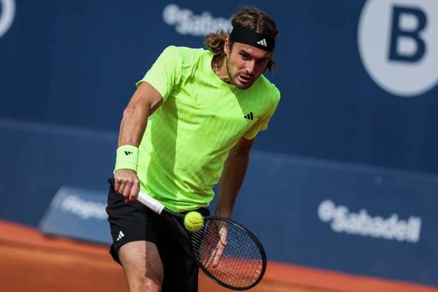 April 15, 2025, Barcelona, Barcelona, Spain: Stefanos Tsitsipas of Greece in actions against Reilly Opelka of United States during the first round tennis match of the Barcelona Open Banc Sabadell - Conde Godo 2025 Day 2 at Real Club De Tenis Barcelona on April 15, 2025 in Barcelona, Spain. Barcelona Spain - ZUMAa181 20250415_zaa_a181_125 Copyright: xJavierxBorregox