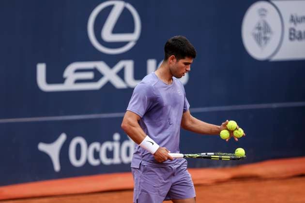 April 15, 2025, Barcelona, Barcelona, Spain: Carlos Alcaraz of Spain in actions against Ethan Quinn of United Stated during the first round tennis match of the Barcelona Open Banc Sabadell - Conde Godo 2025 Day 2 at Real Club De Tenis Barcelona on April 15, 2025 in Barcelona, Spain. Barcelona Spain - ZUMAa181 20250415_zaa_a181_101 Copyright: xJavierxBorregox