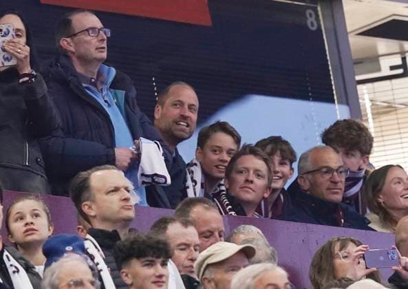 Birmingham, England, 15th April 2025. Aston Villa fans Prince Wiliam and his son Prince George look on during the Aston Villa vs Paris Saint Germain Quarter Final 2nd Leg UEFA Champions League match at Villa Park, Birmingham. Picture credit should read: Andrew Yates Sportimage EDITORIAL USE ONLY. No use with unauthorised audio, video, data, fixture lists, club league logos or live services. Online in-match use limited to 120 images, no video emulation. No use in betting, games or single club league player publications. SPI_025_AY_Villa_PSG SPI-3842-0025