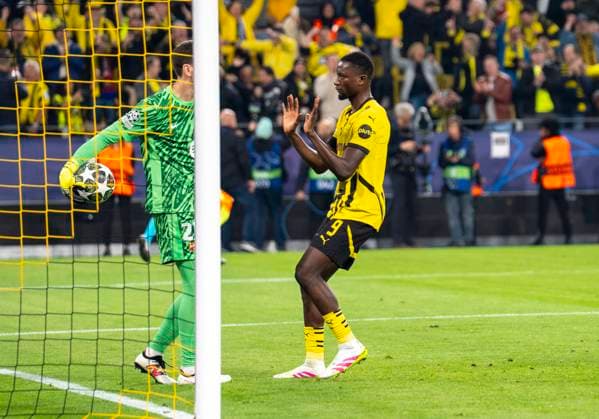 Serhou Guirassy Borussia Dortmund, 9 challenges the ball from goalkeeper, Goalkeeper Wojciech Szczesny FC Barcelona, 25 after the penalty Borussia Dortmund vs FC Barcelona, Football, UEFA Champions League quarter-final second leg, 2024 2025 season, 15 04 2025 DFL regulations prohibit any use of photographs as image sequences and or quasi video Copyright: HMBxMedia xMarcoxBader