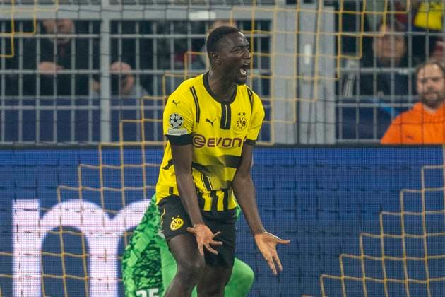 15 04 2025, Borussia Dortmund vs FC Barcelona, UEFA Champions League, quarter-final, second leg Dortmunds Serhou Guirassy screams Important note According to UEFA regulations, it is prohibited to use or have used photographs taken in the stadium and or of the match in the form of sequential images and or video-like photo series Copyright: xDavidxInderliedx