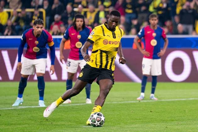 2025-04-15 Borussia Dortmund v FC Barcelona, Barca - UEFA Champions League 2024 25 Quarter Final Second Leg DORTMUND, GERMANY - APRIL 15: Serhou Guirassy of Borussia Dortmund scores the team s first goal during the UEFA Champions League 2024 25 Quarter Final Second Leg match between Borussia Dortmund and FC Barcelona at BVB Stadion Dortmund on April 15, 2025 in Dortmund, Germany. Dortmund BVB Stadion Dortmund Germany Content not available for redistribution in The Netherlands directly or indirectly through any third parties. Copyright: xJorisxVerwijstx