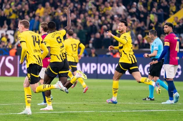 2025-04-15 Borussia Dortmund v FC Barcelona, Barca - UEFA Champions League 2024 25 Quarter Final Second Leg DORTMUND, GERMANY - APRIL 15: Serhou Guirassy of Borussia Dortmund celebrates after scoring the team s first goal with Maximilian Beier of Borussia Dortmund during the UEFA Champions League 2024 25 Quarter Final Second Leg match between Borussia Dortmund and FC Barcelona at BVB Stadion Dortmund on April 15, 2025 in Dortmund, Germany. Dortmund BVB Stadion Dortmund Germany Content not available for redistribution in The Netherlands directly or indirectly through any third parties. Copyright: xJorisxVerwijstx