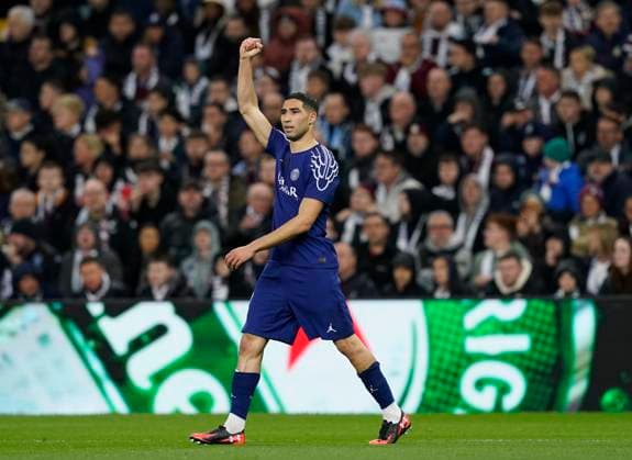 Birmingham, England, 15th April 2025. Achraf Hakimi of Paris St Germain celebrates scoring their first goal during the Aston Villa vs Paris Saint Germain Quarter Final 2nd Leg UEFA Champions League match at Villa Park, Birmingham. Picture credit should read: Andrew Yates Sportimage EDITORIAL USE ONLY. No use with unauthorised audio, video, data, fixture lists, club league logos or live services. Online in-match use limited to 120 images, no video emulation. No use in betting, games or single club league player publications. SPI_036_AY_Villa_PSG SPI-3842-0036