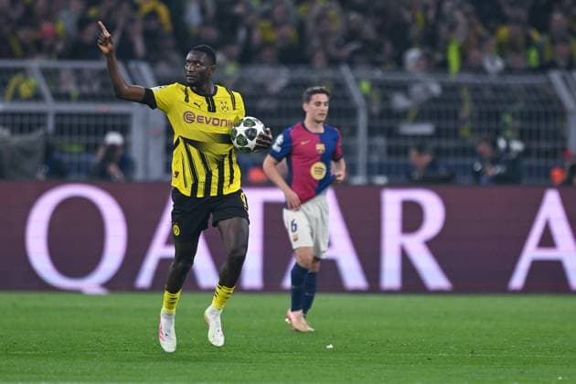 15 04 2025, Football, Champions League, quarter-finals, 2024 2025 season, Borussia Dortmund FC Barcelona, Ramy Bensebaini Borussia Dortmund , Serhou Guirassy Borussia Dortmund celebrates the 1-0 goal, xRHR PHOTO TKx Copyright: RHR-FOTOx RHR-FOTO TK
