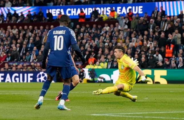 Birmingham, England, 15th April 2025. Achraf Hakimi of Paris St Germain (hidden) scores the first goal during the Aston Villa vs Paris Saint Germain Quarter Final 2nd Leg UEFA Champions League match at Villa Park, Birmingham. Picture credit should read: Andrew Yates Sportimage EDITORIAL USE ONLY. No use with unauthorised audio, video, data, fixture lists, club league logos or live services. Online in-match use limited to 120 images, no video emulation. No use in betting, games or single club league player publications. SPI_0412AY_Villa_PSG SPI-3842-0041