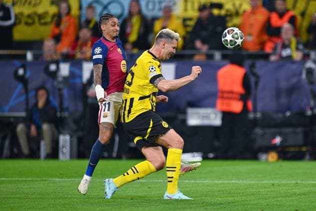 15 04 2025, Football, Champions League, quarter-finals, 2024 2025 season, Borussia Dortmund FC Barcelona, Raphinha FC Barcelona , Niklas Süle Borussia Dortmund xRHR PHOTO TKx Copyright: RHR-FOTOx RHR-FOTO TK