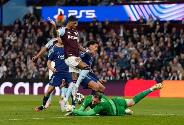 Birmingham, England, 15th April 2025. Gianluigi Donnarumma of Paris St Germain saves at the feet of Aston Villa s Marcus Rashford during the Aston Villa vs Paris Saint Germain Quarter Final 2nd Leg UEFA Champions League match at Villa Park, Birmingham. Picture credit should read: Andrew Yates Sportimage EDITORIAL USE ONLY. No use with unauthorised audio, video, data, fixture lists, club league logos or live services. Online in-match use limited to 120 images, no video emulation. No use in betting, games or single club league player publications. SPI_081_AY_Villa_PSG SPI-3842-0079