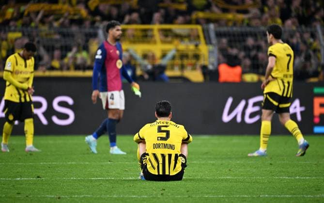 Football, Champions League, Germany, Men, Season 2024 2025, Quarter-final second leg, Signal Iduna Park Dortmund Bor Dortmund FC Barcelona 3 1 Ramy Bensebaini BVB disappointed after the end of the match Disappointment, frustration, action