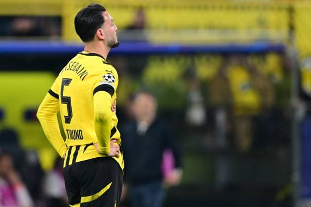 DORTMUND - Ramy Bensebaini of Borussia Dortmund is disappointed with his own goal during the quarterfinal Champions League match between Borussia Dortmund and FC Barcelona, Barca at the Signal Iduna Park stadium on April 15, 2025 in Dortmund, Germany. ANP Hollandse Hoogte Borussia Dortmund v FC Barcelona 2024 25 xVIxANPxSportx xGerritxvanxKeulenxIVx 524606504 originalFilename: 524606504.jpg