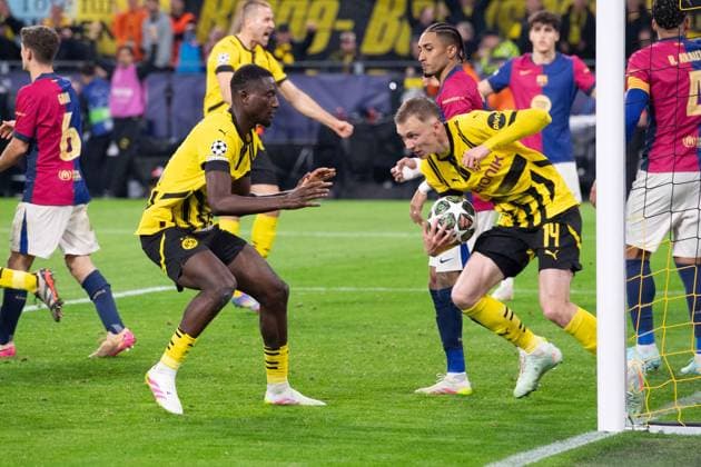 Serhou GUIRASSY DO scores the goal to 2 0 with a header, action, cheers with Maximilian BEIER DO , cheers, jubilation, joy, cheers, Football Champions League, Quarterfinals, Round of 8, Borussia Dortmund DO FC Barcelona Barca 3 1 on 15 04 2025 in Dortmund Germany UEFA regulations prohibit any use of photographs as image sequences and or quasi video Â
