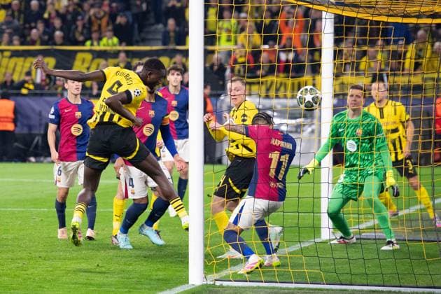 Serhou GUIRASSY DO scores with a header to make it 2 0, Action, Football Champions League, Quarterfinals, Round of 8, Borussia Dortmund DO FC Barcelona Barca 3 1 on 15 04 2025 in Dortmund Germany UEFA regulations prohibit any use of photographs as image sequences and or quasi video Â