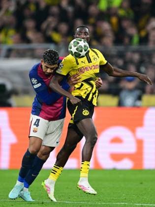 DORTMUND - (l-r) Ronald Araujo of FC Barcelona, Barca Sehrou Guirassy of Borussia Dortmund during the quarterfinal Champions League match between Borussia Dortmund and FC Barcelona at Signal Iduna Park stadium on April 15, 2025 in Dortmund, Germany. ANP Hollandse Hoogte Borussia Dortmund v FC Barcelona 2024 25 xVIxANPxSportx xGerritxvanxKeulenxIVx 524606557 originalFilename: 524606557.jpg