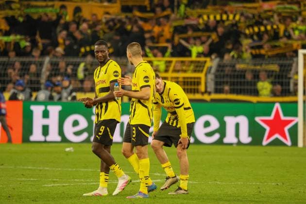 15 04 2025, xfanx, Football UEFA Champions League, Borussia Dortmund FC Barcelona v l Serhou Guirassy BVB and Waldemar Anton BVB DFL DFB REGULATIONS PROHIBIT ANY USE OF PHOTOGRAPHS as IMAGE SEQUENCES and or QUASI VIDEO Dortmund mfan