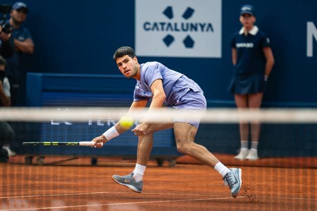 (250416) -- BARCELONA, April 16, 2025 -- Carlos Alcaraz hits a return during the first round of Barcelona Open Banc Sabadell match between Carlos Alcaraz of Spain and Ethan Quinn of the United States, in Barcelona, Spain, April 15, 2025. (Photo by Xinhua) (SP)SPAIN-BARCELONA-TENNIS-BARCELONA OPEN Joanxgosa 