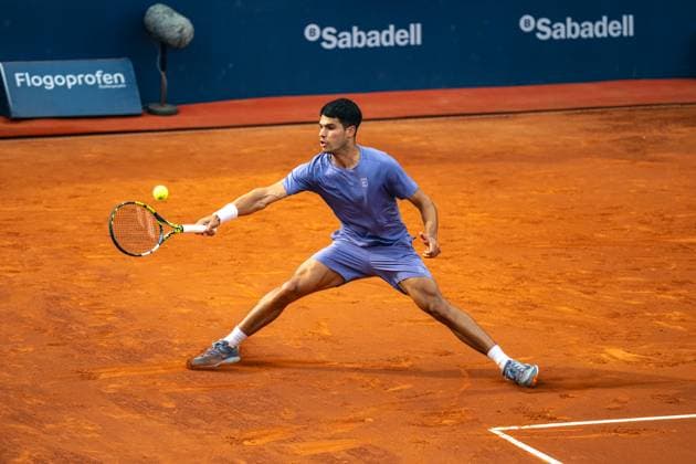 (250416) -- BARCELONA, April 16, 2025 -- Carlos Alcaraz hits a return during the first round of Barcelona Open Banc Sabadell match between Carlos Alcaraz of Spain and Ethan Quinn of the United States, in Barcelona, Spain, April 15, 2025. (Photo by Xinhua) (SP)SPAIN-BARCELONA-TENNIS-BARCELONA OPEN Joanxgosa 