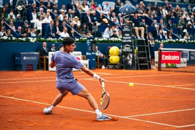 (250416) -- BARCELONA, April 16, 2025 -- Carlos Alcaraz hits a return during the first round of Barcelona Open Banc Sabadell match between Carlos Alcaraz of Spain and Ethan Quinn of the United States, in Barcelona, Spain, April 15, 2025. (Photo by Xinhua) (SP)SPAIN-BARCELONA-TENNIS-BARCELONA OPEN Joanxgosa 