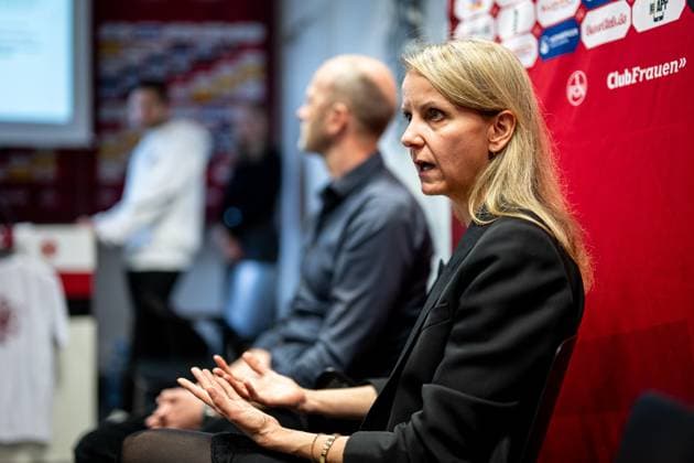 15 04 2025 1 FC Nürnberg Nuernberg FCN Club Media event Press event Anniversary 125 years 1 FC Nürnberg Presentation Activities ThHa xthxhax Katharina Fritsch Head of Corporate Communications 1 FC Nürnberg FCN in front of Niels Rossow Board Member Strategy Marketing 1 FC Nürnberg FCN