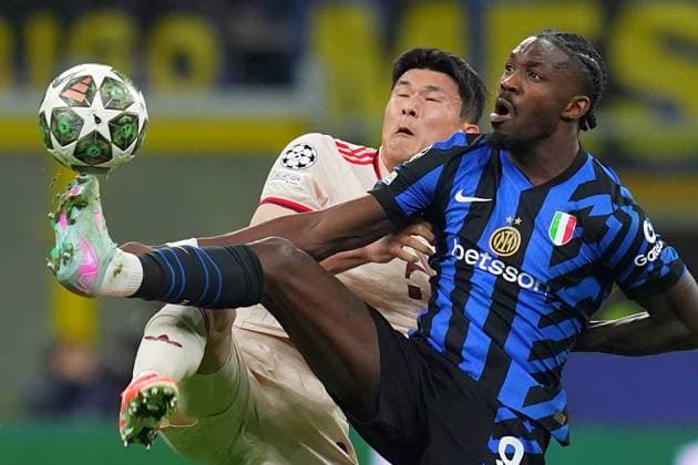 Inter Milan s Marcus Thuram fights for the ball with Bayern s Kim Min-jae during the Uefa Champions League soccer match between Inter and Bayern Munich at San Siro Stadium in Milan , North Italy - , Wednesday April 16, 2025 . - Soccer  Copyright: xSpada LaPressex