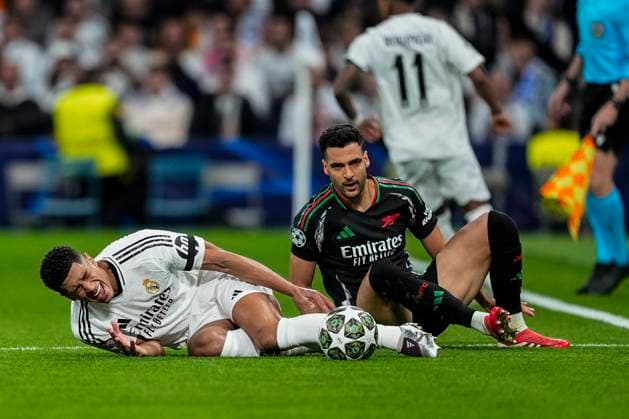 April 16, 2025, Madrid, Madrid, SPAIN: Jude Bellingham of Real Madrid and Mikel Merino of Arsenal FC in action during the UEFA Champions League 2024 25 Quarter Final Second Leg match between Real Madrid C.F. and Arsenal FC at Santiago Bernabeu stadium on April 16, 2025, in Madrid, Spain. Madrid SPAIN - ZUMAa181 20250416_zaa_a181_086 Copyright: xOscarxJ.xBarrosox