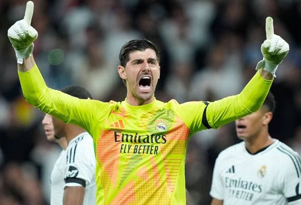 Real Madrid Goalkeeper Thibaut Courtois celebrates saving a penalty by Bukayo Saka of Arsenal Real Madrid v Arsenal, UEFA Champions League, Quarter-Finals, 2nd Leg, Football, Santiago Bernabu Stadium, Madrid, Spain - 16 Apr 2025 EDITORIAL USE ONLY No use with unauthorised audio, video, data, fixture lists, club league logos or live services. Online in-match use limited to 120 images, no video emulation. No use in betting, games or single club league player publications.  Copyright: xGokhanxTaner Shutterstockx 15253937ah