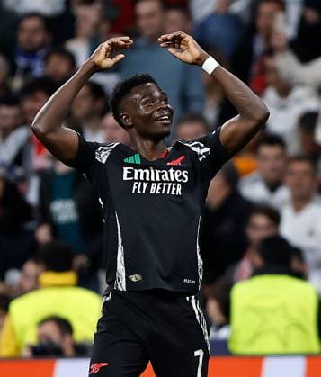 Bukayo Saka of Arsenal celebrates scoring a goal to make the score 0-1 Real Madrid v Arsenal, UEFA Champions League, Quarter-Finals, 2nd Leg, Football, Santiago Bernabu Stadium, Madrid, Spain - 16 Apr 2025 EDITORIAL USE ONLY No use with unauthorised audio, video, data, fixture lists, club league logos or live services. Online in-match use limited to 120 images, no video emulation. No use in betting, games or single club league player publications.  Copyright: xRubenxAlbarran Shutterstockx 15253938cl