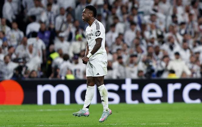 Vinicius Junior of Real Madrid celebrates scoring a goal to make the score 1-1 Real Madrid v Arsenal, UEFA Champions League, Quarter-Finals, 2nd Leg, Football, Santiago Bernabu Stadium, Madrid, Spain - 16 Apr 2025 EDITORIAL USE ONLY No use with unauthorised audio, video, data, fixture lists, club league logos or live services. Online in-match use limited to 120 images, no video emulation. No use in betting, games or single club league player publications. Copyright: xRubenxAlbarran Shutterstockx 15253938cm
