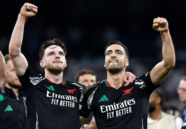 Declan Rice and Mikel Merino of Arsenal celebrate at full time Real Madrid v Arsenal, UEFA Champions League, Quarter-Finals, 2nd Leg, Football, Santiago Bernabu Stadium, Madrid, Spain - 16 Apr 2025 EDITORIAL USE ONLY No use with unauthorised audio, video, data, fixture lists, club league logos or live services. Online in-match use limited to 120 images, no video emulation. No use in betting, games or single club league player publications. Copyright: xRubenxAlbarran Shutterstockx 15253938dz