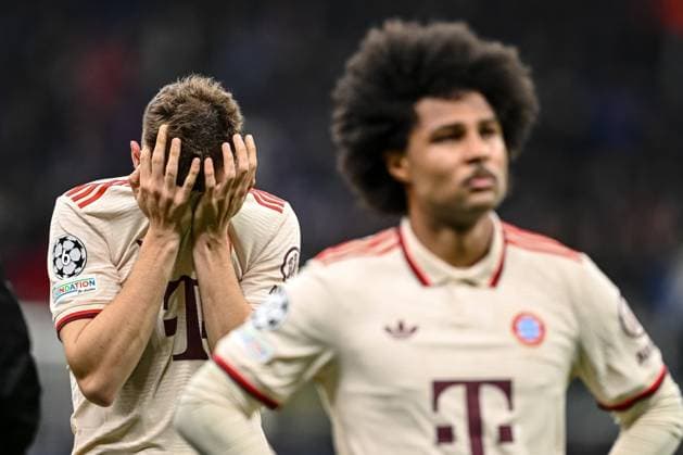 Josip Stanisic FC Bayern Muenchen and Serge Gnabry FC Bayern Muenchen look dejected during the UEFA Champions League 2024 25 Quarter Final Second Leg match between FC Internazionale Milano and FC Bayern München at San Siro on April 16, 2025 in Milan, Italy Photo by Harry Langer DeFodi Images