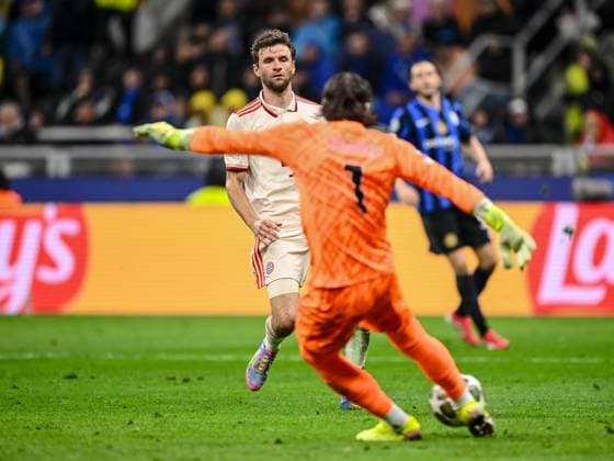 Thomas Mueller FC Bayern Muenchen and goalkeeper Yann Sommer FC Internazionale Milano battle for the ball during the UEFA Champions League 2024 25 Quarter Final Second Leg match between FC Internazionale Milano and FC Bayern München at San Siro on April 16, 2025 in Milan, Italy Photo by Harry Langer DeFodi Images