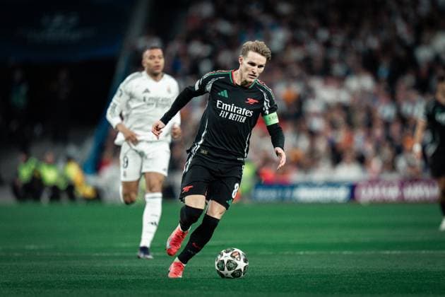 Fußball, CL, Real Madrid - FC Arsenal Real Madrid CF v Arsenal FC- UEFA Champions League MADRID, SPAIN, APRIL 16: Martin Odegaard of Arsenal FC during the 2st leg UEFA Champions League round of 8 between Real Madrid CF and Arsenal FC at Estadio Santiago Bernabeu on April 16, 2025 in Madrid, Spain. Madrid Estadio Santiago Bernabeu Madrid Spain Copyright: xAlexxPerezx RealMadridArsenal16april395