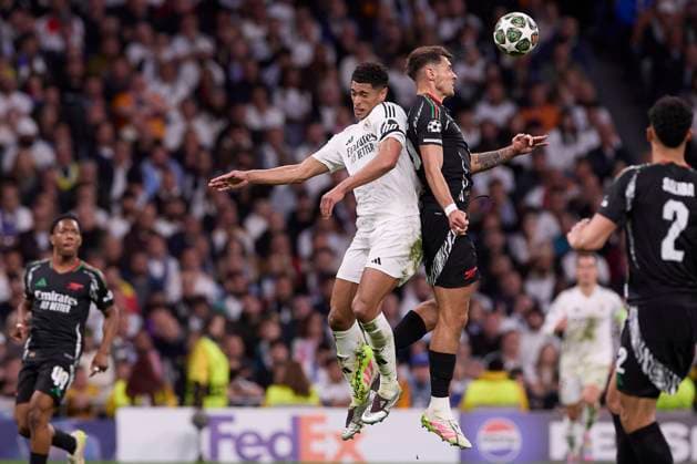 Fußball, CL, Real Madrid - FC Arsenal April 16, 2025, Madrid, Spain: Jakub Kiwior (R) of Arsenal FC and Jude Bellingham (L) of Real Madrid CF seen in action during the UEFA Champions League 2024 25 Quarter Final Second Leg match between Real Madrid CF and Arsenal FC at Santiago Bernabeu Stadium. Final score: Real Madrid CF 1 : 2 Arsenal FC Madrid Spain - ZUMAs197 20250416_aaa_s197_086 Copyright: xFedericoxTitonex