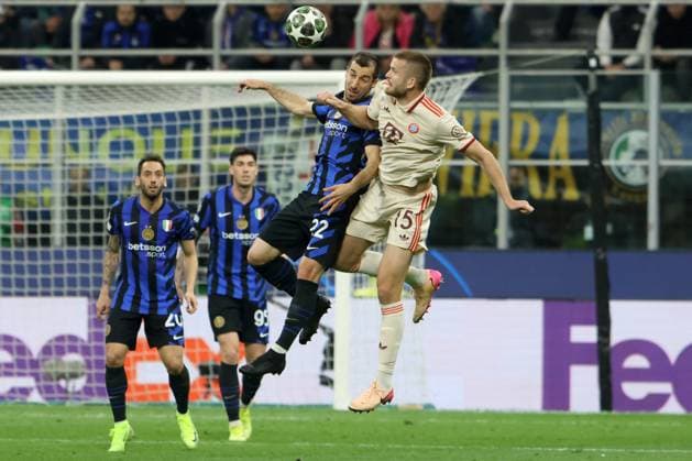 HENRIKH MKHITARYAN, Inter, ERIC DIER, Bayern Monaco, Champions League, 2024-25, Inter vs Bayern Munich 2-2, 16-04-2025, Contrasto, Action CHAMPIONS LEAGUE 2024-25 INTER-BAYERN MONACO 2-2