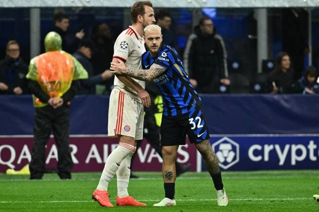 CALCIO - UEFA Champions League - Inter - FC Internazionale vs Bayern Munich Harry Kane of F.C. Bayern Munchen and Federico Dimarco of F.C. Inter particPhoto by IPA ABACAPRESS.COMtes in the UEFA Champions League 2024 25 Quarter Final Second Leg match between FC Internazionale Milano and FC Bayern Munchen at San Siro Stadium on April 16, 2025 in Milan, Italy Milan Italy  Copyright: xIPAxSport ABACAx