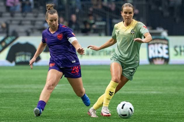 April 16, 2025, Vancouver, Bc, CANADA: Calgary Wild s Meggie Dougherty Howard and Vancouver Rise s Nicole Stanton vie for the ball during the first half of an NSL match in Vancouver on Wednesday, April 16, 2025. Canada News - April 16, 2025  - ZUMAc35_ 20250416_zaf_c35_237 Copyright: xEthanxCairnsx