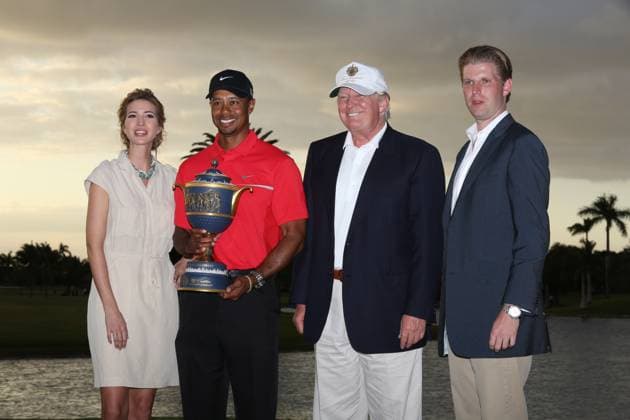 The 2013 WGC-Cadillac Championship Tiger Woods wins with the trophy during the final round at the Cadillac WGC Doral, Miami, USA With Ivanka Trump (left), Donald Trump, Donald Trump Jnr (right) March 2013 Copyright: xMarkxNewcombex