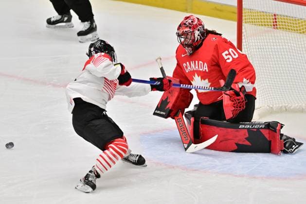 L-R Hikaru Yamashita (JPN) and goalkeeper Kristen Campbell (CAN) in action during the IIHF Women s World Championship, WM, Weltmeisterschaft quarterfinal match Canada vs Japan, in Ceske Budejovice, Czech Republic, on April 17, 2025. (CTKxPhoto VaclavxPancer) CTKPhotoP2025041708535  CTKPhotoP2025041708535