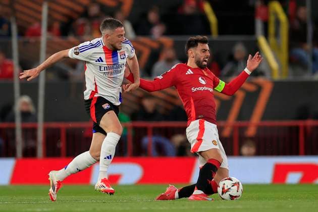 Manchester United, ManU v Olympique Lyonnais Europa League 17 04 2025. Quarter Final leg 2 of 2 Bruno Fernandes (8) of Manchester United is held back bu Jordan Veretout (7) of Olympique Lyonnais during the Europa League quarter final second leg match between Manchester United and Olympique Lyonnais at Old Trafford, Manchester, England on 17 April 2025. Manchester Old Trafford Greater Manchester England Editorial use only , Copyright: xConorxMolloyx PSI-21857-0049