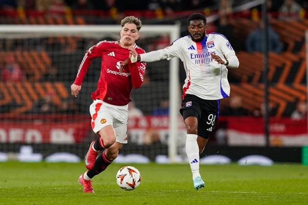 Manchester, England, 17th April 2025. Alejandro Garnacho of Manchester United, ManU and Ainsley Maitland-Niles of Lyon battle for the ball during the Manchester United vs Olympique Lyonnais Quarter Final 2nd Leg UEFA Europa League match at Old Trafford, Manchester. Picture credit should read: Andrew Yates Sportimage EDITORIAL USE ONLY. No use with unauthorised audio, video, data, fixture lists, club league logos or live services. Online in-match use limited to 120 images, no video emulation. No use in betting, games or single club league player publications. SPI_070_AY_MANCHESTER_UNITED_V_OLYMPIQUE_LYONNAIS SPI-3844-0049